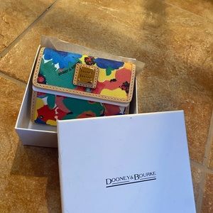 Floral, Dooney and Bourke wallet, new with tags!